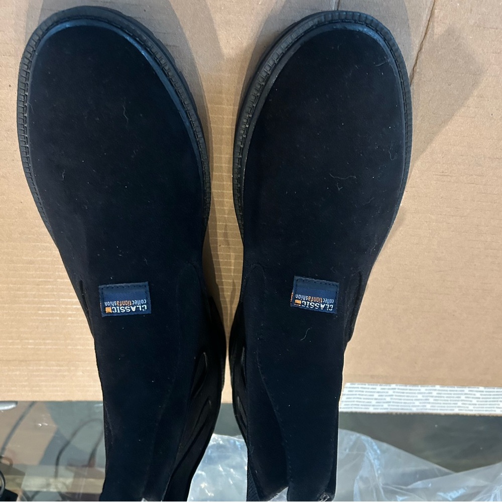 Classic Black Boots with Slip-On Style and Rounded Toe
